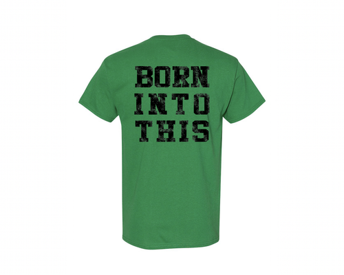 Back shot of a green tee shirt with "BORN INTO THIS" in a black distressed graphic.